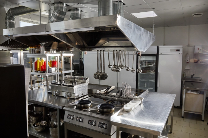 Clean Restaurant style Kitchen with silver Appliances